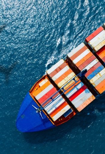 Aerial,View,Of,The,Freight,Shipping,Transport,System,Cargo,Ship