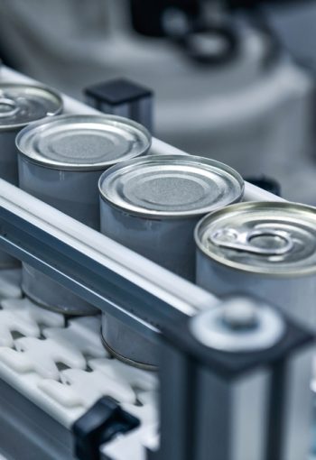 Canned,Food,Products,On,Conveyor,Belt,In,Distribution,Warehouse.food,Transportation