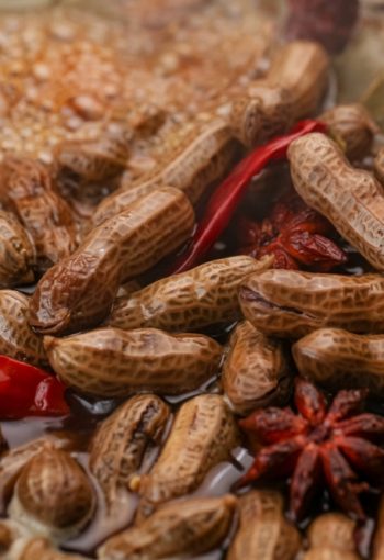 Boiled,Peanuts,With,Chili,Peppers,And,Star,Anise,In,Dark